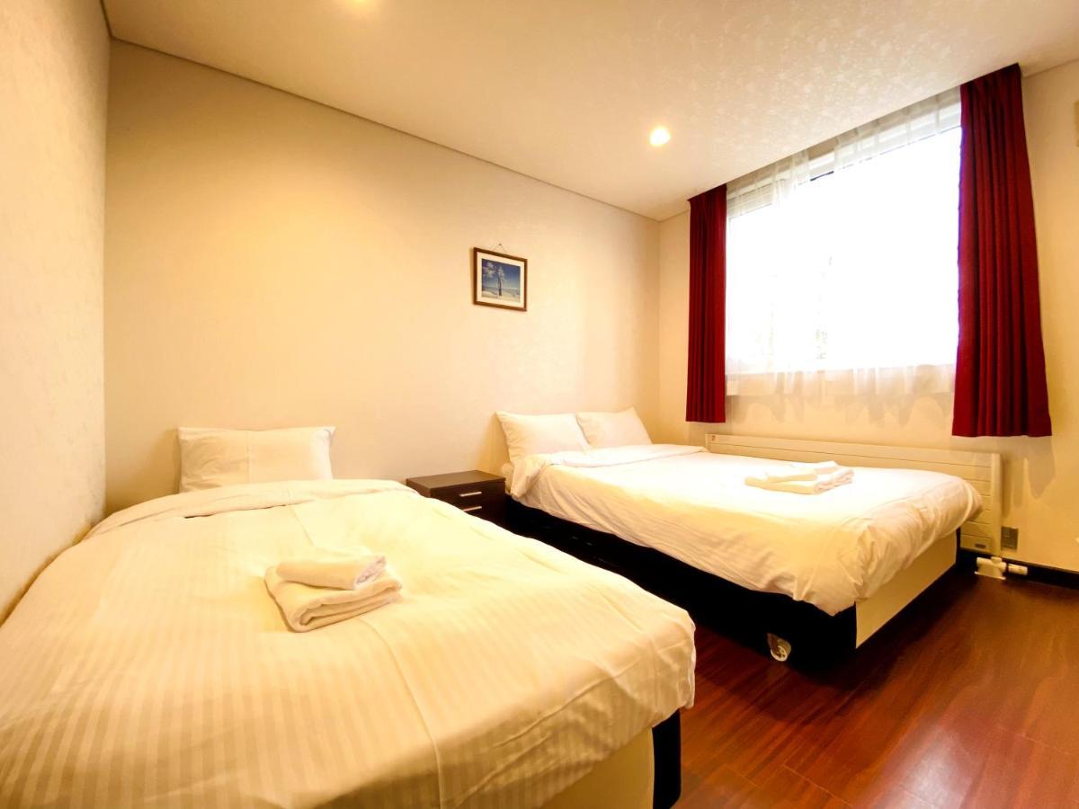 Petit Hotel Melon Furano Exterior photo
